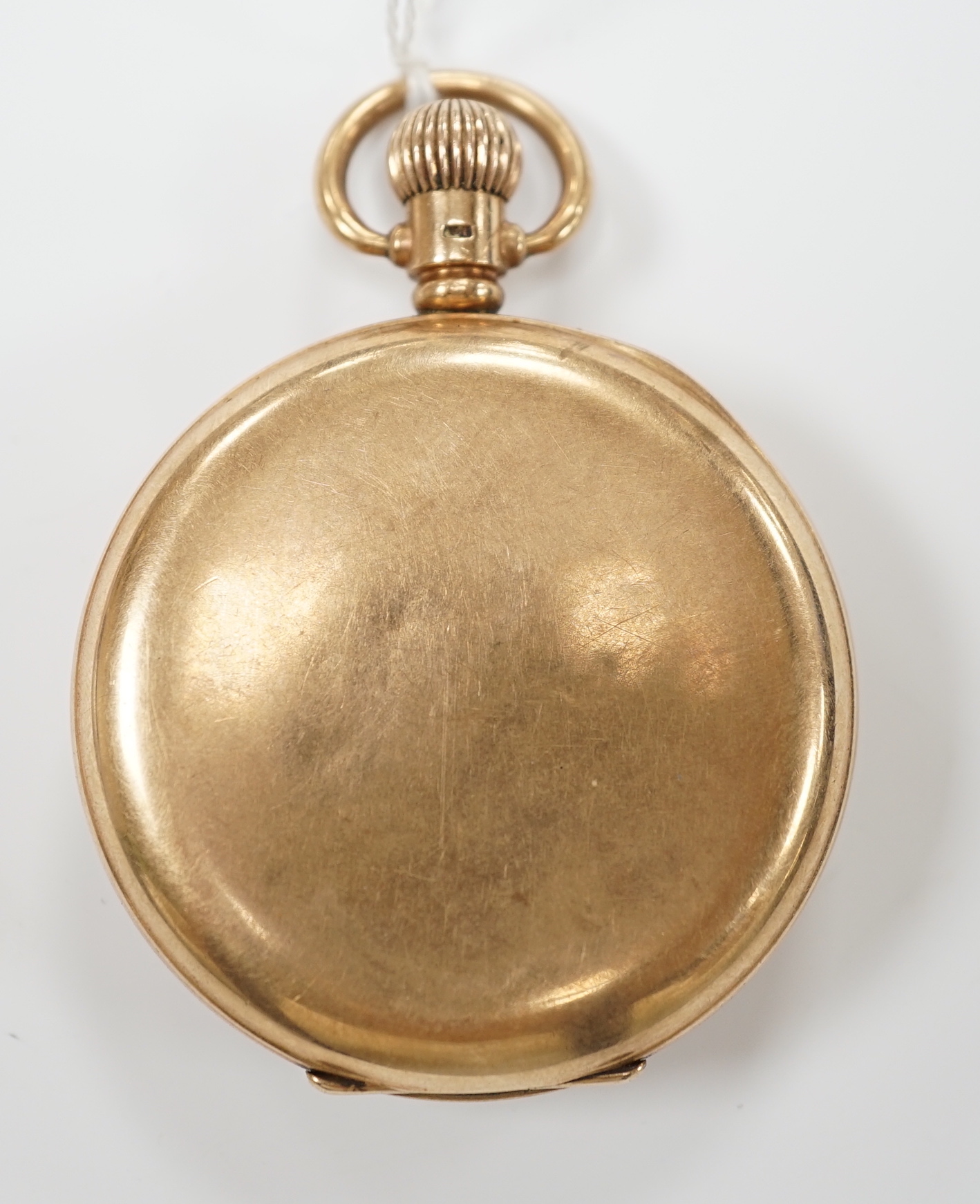 A George V 9ct gold open face keyless pocket watch, case diameter 48mm, gross weight 87.4 grams.